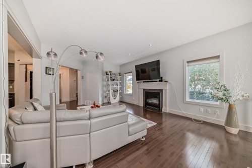 3503 Goodridge Bay Nw, Edmonton, AB - Indoor Photo Showing Living Room With Fireplace