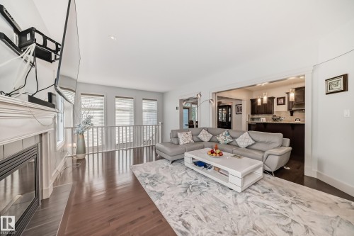 3503 Goodridge Bay Nw, Edmonton, AB - Indoor Photo Showing Living Room With Fireplace