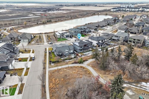 Aerial view of property and surrounding area with a large body of water and nearby suburban area - 10 Legacy Terrace, St. Albert, AB - Outdoor With View