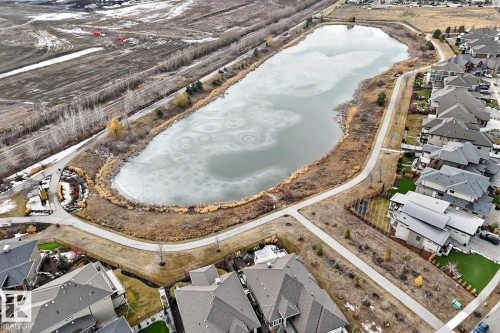 Aerial view of property's location featuring a nearby body of water and nearby suburban area - 10 Legacy Terrace, St. Albert, AB - Outdoor With View
