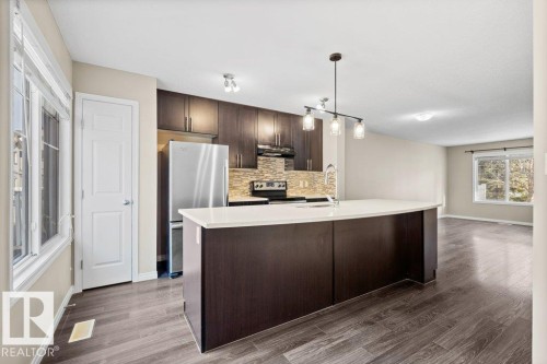 24 4850 Terwillegar Common, Edmonton, AB - Indoor Photo Showing Kitchen With Upgraded Kitchen