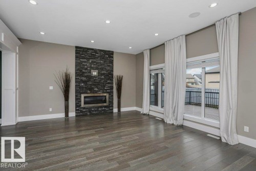 2453 Ashcraft Crescent, Edmonton, AB - Indoor Photo Showing Living Room With Fireplace