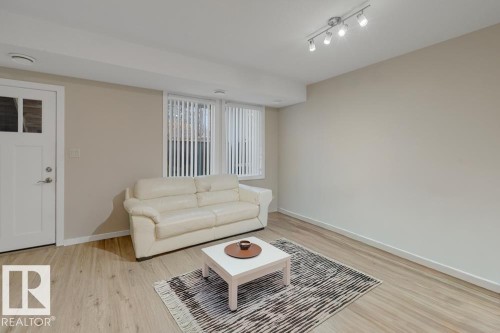 11840B 122 Street, Edmonton, AB - Indoor Photo Showing Living Room