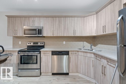 11840B 122 Street, Edmonton, AB - Indoor Photo Showing Kitchen With Double Sink