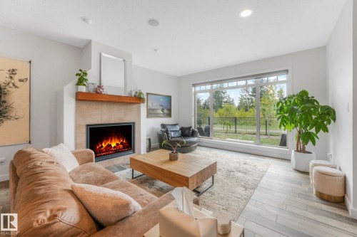 2441 Bowen Wynd, Edmonton, AB - Indoor Photo Showing Living Room With Fireplace