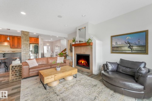 2441 Bowen Wynd, Edmonton, AB - Indoor Photo Showing Living Room With Fireplace