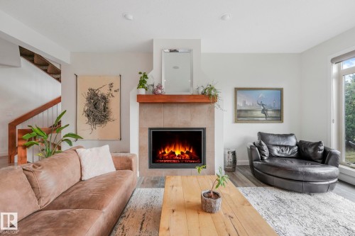 2441 Bowen Wynd, Edmonton, AB - Indoor Photo Showing Living Room With Fireplace
