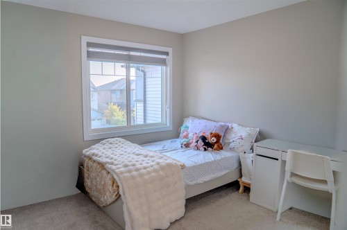 7627 Creighton, Edmonton, AB - Indoor Photo Showing Bedroom