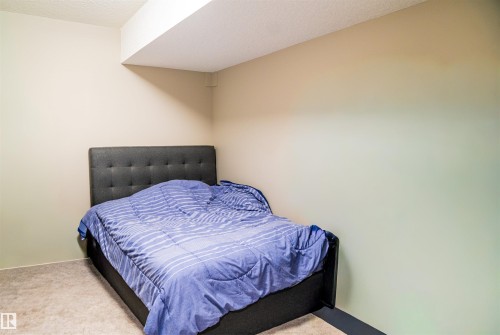7627 Creighton, Edmonton, AB - Indoor Photo Showing Bedroom