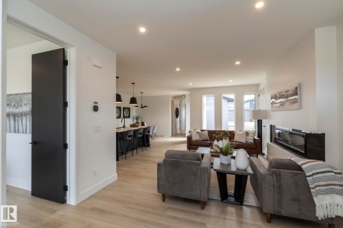 4541 Knight Wynd, Edmonton, AB - Indoor Photo Showing Living Room With Fireplace