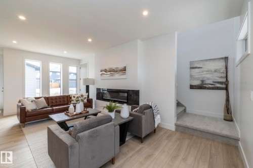 4541 Knight Wynd, Edmonton, AB - Indoor Photo Showing Living Room With Fireplace