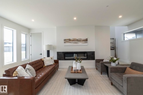 4541 Knight Wynd, Edmonton, AB - Indoor Photo Showing Living Room With Fireplace