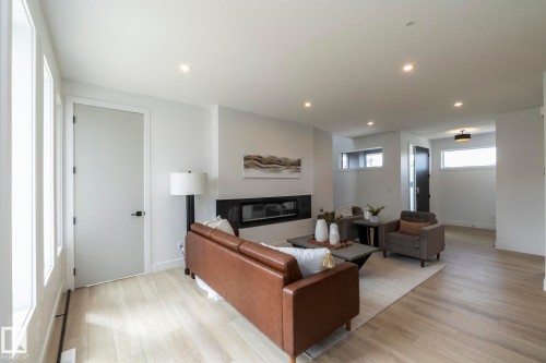 4541 Knight Wynd, Edmonton, AB - Indoor Photo Showing Other Room With Fireplace