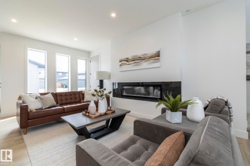 4541 Knight Wynd, Edmonton, AB - Indoor Photo Showing Living Room With Fireplace