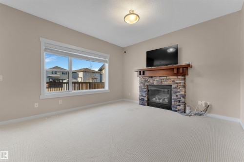 3650 13 Street, Edmonton, AB - Indoor Photo Showing Living Room With Fireplace
