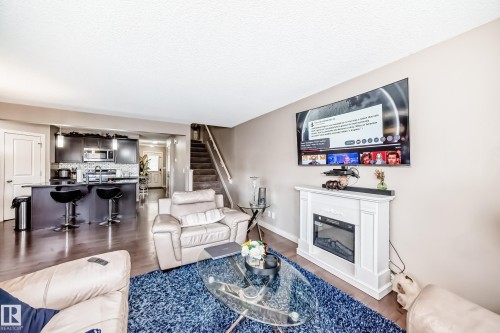 1717 Hammond Crescent Nw, Edmonton, AB - Indoor Photo Showing Living Room With Fireplace