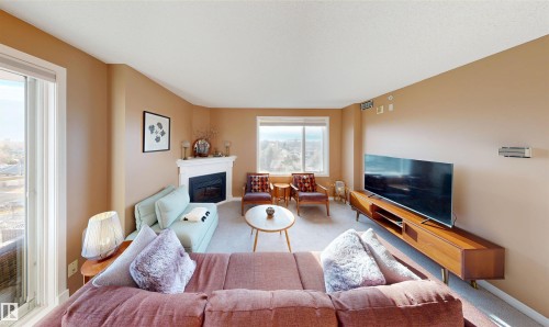 605 10649 Saskatchewan Drive, Edmonton, AB - Indoor With Fireplace