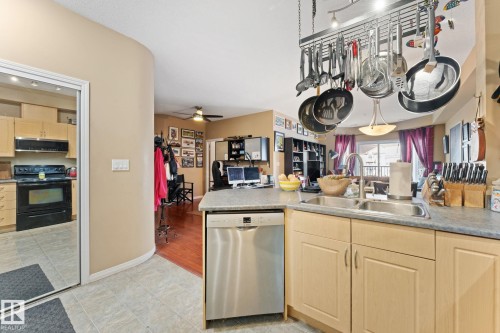 324 4304 139 Avenue Nw, Edmonton, AB - Indoor Photo Showing Kitchen With Double Sink