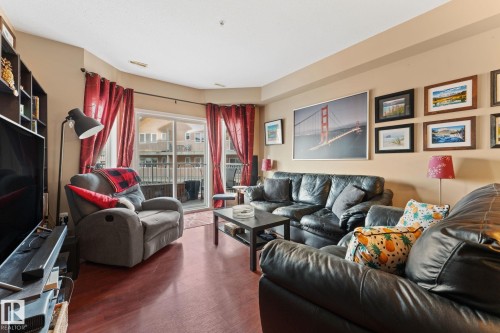 324 4304 139 Avenue Nw, Edmonton, AB - Indoor Photo Showing Living Room With Fireplace