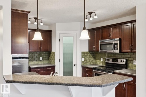 323 Avena Link, Leduc, AB - Indoor Photo Showing Kitchen With Upgraded Kitchen