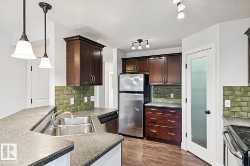 323 Avena Link, Leduc, AB - Indoor Photo Showing Kitchen With Double Sink