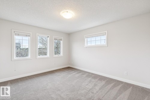 323 Avena Link, Leduc, AB - Indoor Photo Showing Other Room