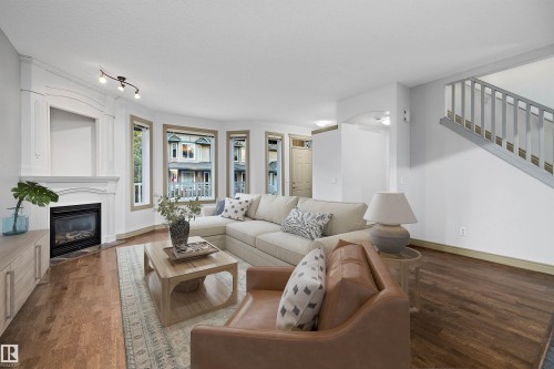 17 903 Rutherford Road, Edmonton, AB - Indoor Photo Showing Living Room With Fireplace