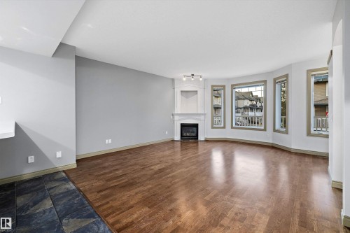 17 903 Rutherford Road, Edmonton, AB - Indoor Photo Showing Living Room With Fireplace
