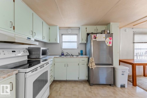 5321 57 Street, Cold Lake, AB - Indoor Photo Showing Kitchen With Double Sink