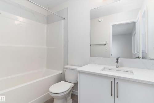 Bathroom with vanity and shower / washtub combination - 823 Rowan Close, Edmonton, AB - Indoor Photo Showing Bathroom
