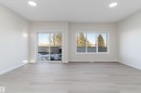 Unfurnished room featuring recessed lighting, light wood-style flooring, and plenty of natural light - 823 Rowan Close, Edmonton, AB  - Indoor Photo Showing Other Room 