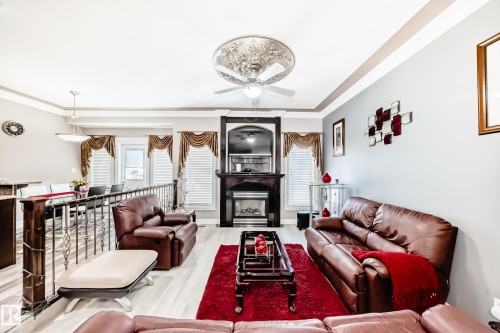 1715 69 Street, Edmonton, AB - Indoor Photo Showing Living Room With Fireplace