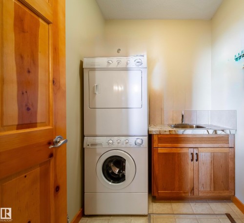 103 Argentia Beach, Rural Wetaskiwin County, AB - Indoor Photo Showing Laundry Room