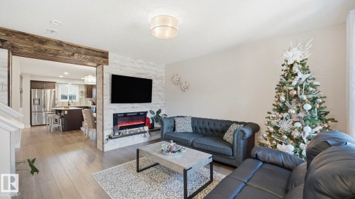 27 Tonewood Boulevard, Spruce Grove, AB - Indoor Photo Showing Living Room With Fireplace