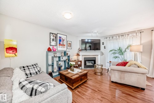 121 Bulyea Road, Edmonton, AB - Indoor Photo Showing Living Room With Fireplace