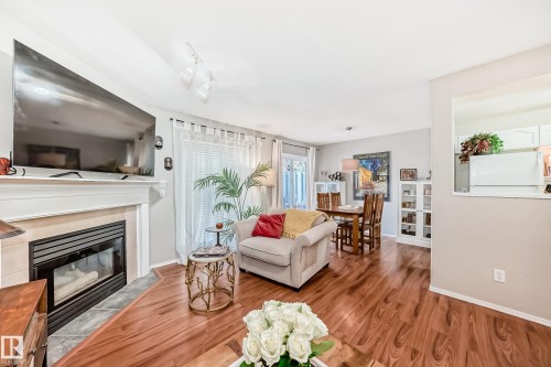 121 Bulyea Road, Edmonton, AB - Indoor Photo Showing Living Room With Fireplace