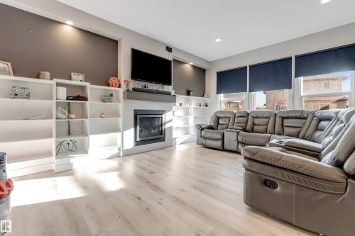 811 35 Avenue, Edmonton, AB - Indoor Photo Showing Living Room With Fireplace