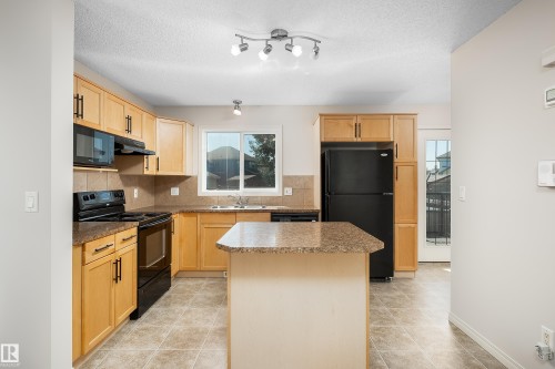 243 Southwick Way, Leduc, AB - Indoor Photo Showing Kitchen With Double Sink