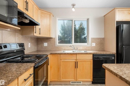 243 Southwick Way, Leduc, AB - Indoor Photo Showing Kitchen With Double Sink