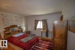 Bedroom featuring wood finished floors - 