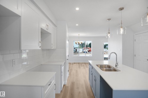 20927 16 Avenue, Edmonton, AB - Indoor Photo Showing Kitchen With Double Sink With Upgraded Kitchen