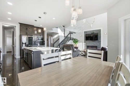 1333 Graydon Hill Way, Edmonton, AB - Indoor Photo Showing Kitchen With Fireplace With Upgraded Kitchen