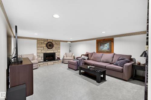743 Lee Ridge Road Nw, Edmonton, AB - Indoor Photo Showing Living Room With Fireplace