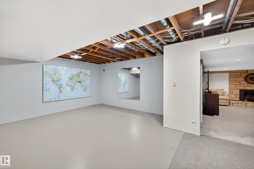 743 Lee Ridge Road Nw, Edmonton, AB - Indoor Photo Showing Other Room With Fireplace