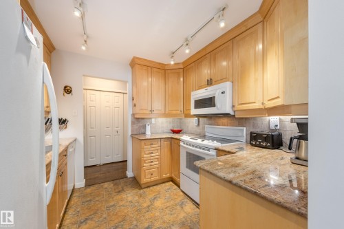 108 14810 51 Avenue, Edmonton, AB - Indoor Photo Showing Kitchen