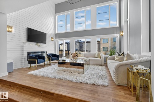 1075 Goldfinch Way, Edmonton, AB - Indoor Photo Showing Living Room With Fireplace