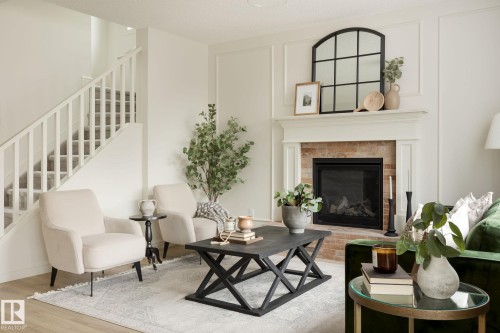 17419 7 Street, Edmonton, AB - Indoor Photo Showing Living Room With Fireplace
