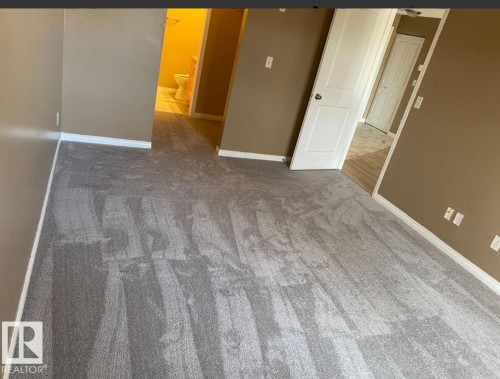 211 245 Edwards Dr Sw, Edmonton, AB - Indoor Photo Showing Other Room