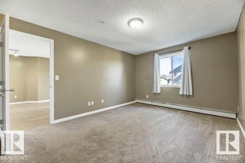 211 245 Edwards Dr Sw, Edmonton, AB - Indoor Photo Showing Other Room