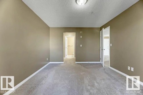 211 245 Edwards Dr Sw, Edmonton, AB - Indoor Photo Showing Other Room